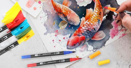 Double sided brush markers on a partially colored picture of a fish