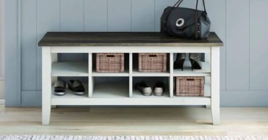 Twin Star Home Two-Tone Storage Bench with Planked Top in Old Wood White in an entryway with shoes and a handbag